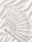 white hand fan