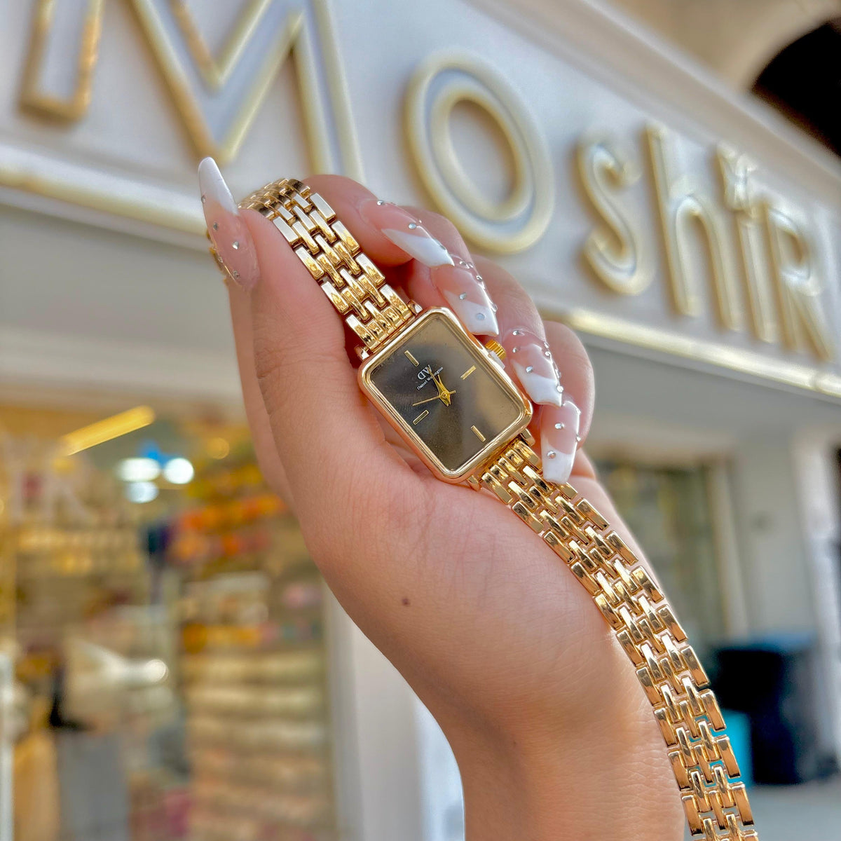 Silver and gold watch